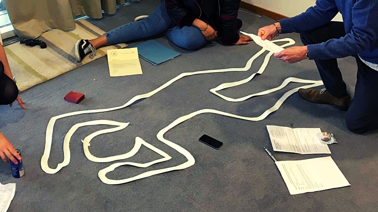 Cropped body outline in a crime scene